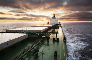 cargo ship underway viewed from bow